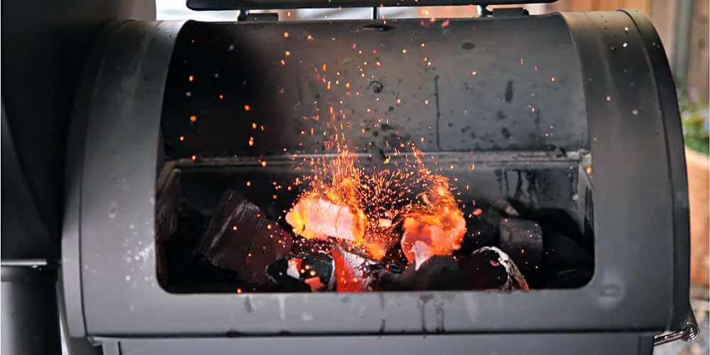 smoker - open with charcoal and fire