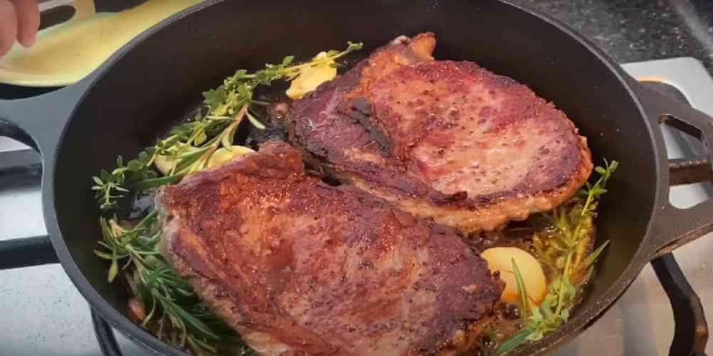 Steak - in a pan with herbs